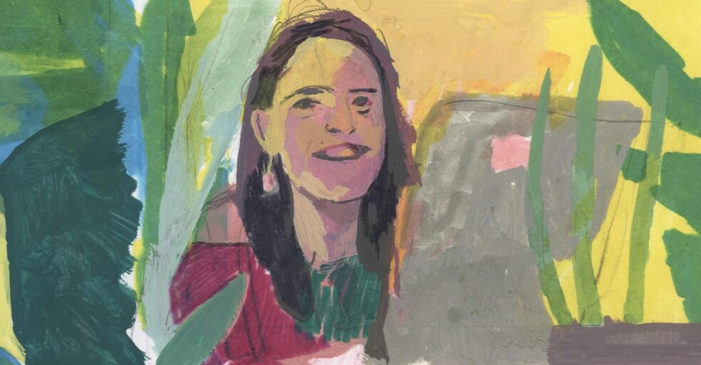 woman smiling as example of employee satisfaction.